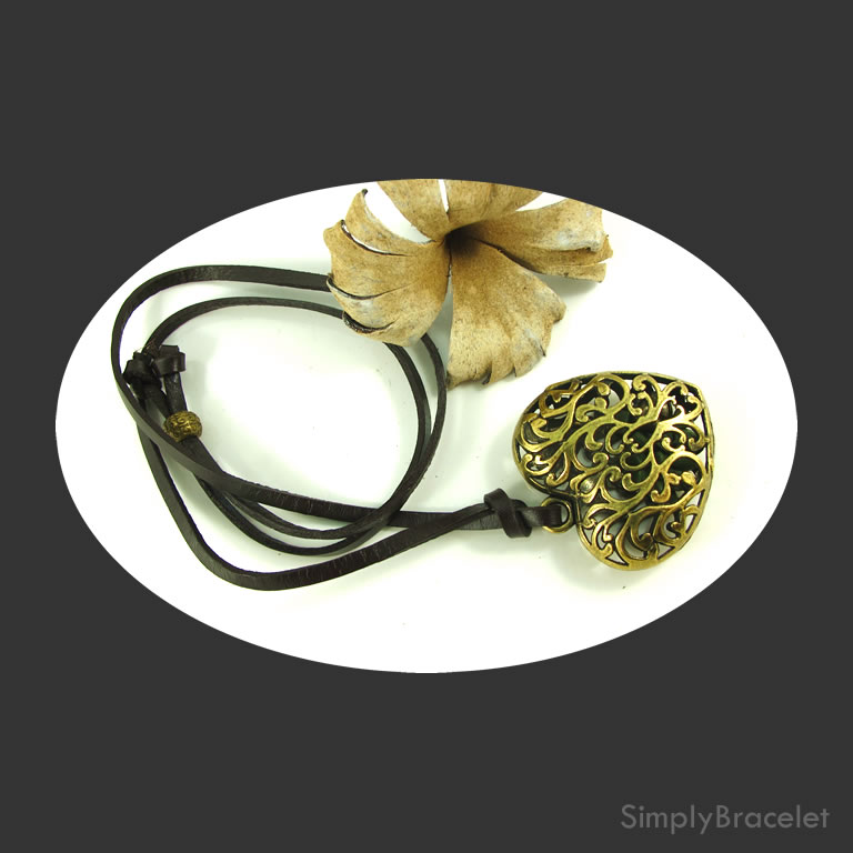 Leather cord, brown, 28 inch, brass-colored heart pendant. ea